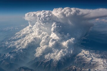 Massive Cumulus Clouds Drifting Over Mountains in Aerial View