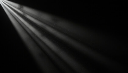 Sunlight beams shining on a dark backdrop