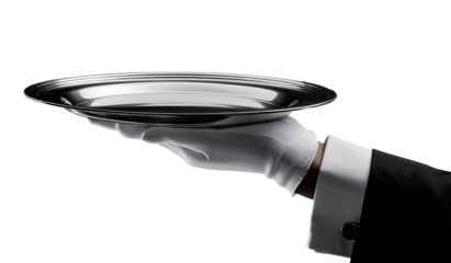 A gloved hand offers a silver platter against a stark black backdrop