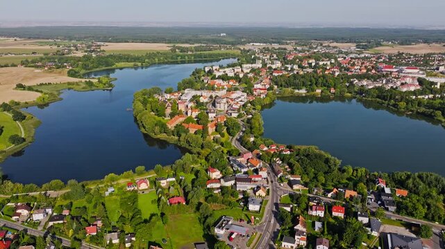 Wide drone view shows Sztum town between lakes greenery and calm life Poland