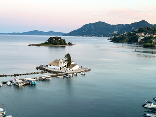 Corfu island Greece, Vlacherna Monastery and Pontikonisi islet, calm water, high angle view.