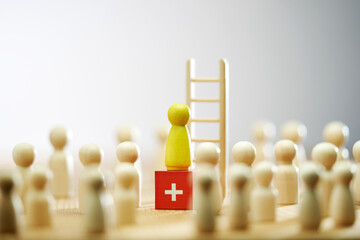  Leadership concept of wooden figurine leading the others