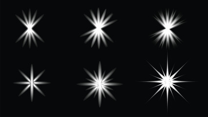 Fototapeta premium White Starburst Sparkle Light Effects Set on Black Background