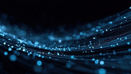 Abstract view of glowing, flowing strands with bokeh, evoking data transfer