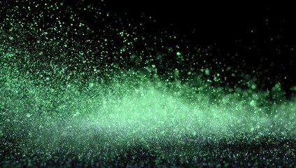 A luminous green particulate explosion against a black background, creating a dazzling abstract effect