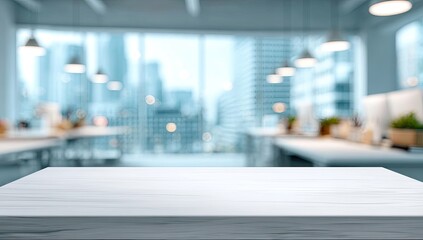 Softly blurred modern office interior with large windows and a marble table