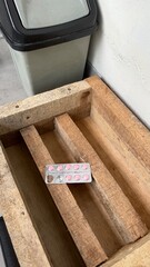 Pink Pills Blister Pack on Wooden Pallet