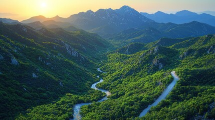 Valley with river flows into the hills at sunrise