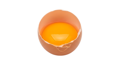 Vibrant raw egg yolk in cracked shell on transparent background