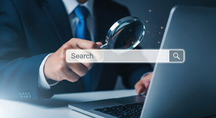 Enhancing Online Visibility A Businessman Using a Magnifying Glass to Focus on a Search Bar for SEO, Digital Marketing, and Website Optimization Strategies