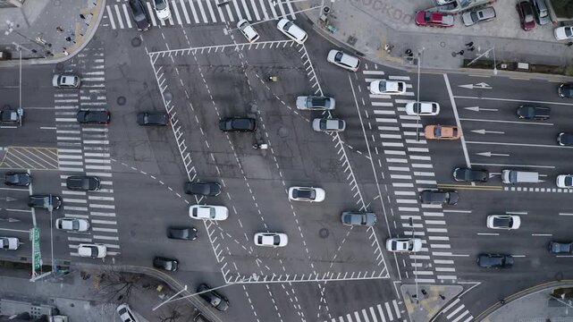 Cars pass through a large intersection in Gangnam, Seoul.