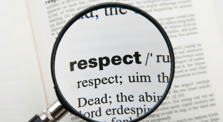 Exploring the Essence of Respect A Close Up View of the Dictionary Definition with a Magnifying Glass Revealing the Importance of Understanding and Valuing Others