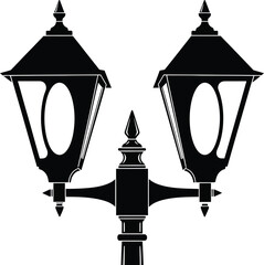 Black double headed outdoor street lamp post silhouette