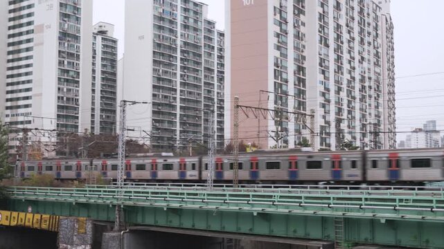 Seoul's Han River Railway Bridge aerial shot, trains and trains pass by.