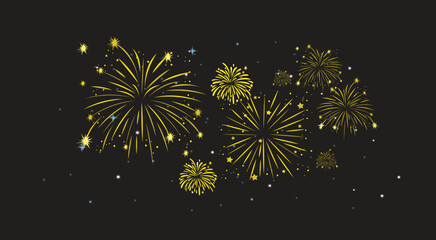 Bright yellow fireworks bursting in the night sky. 