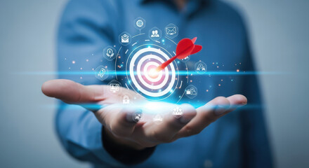 Achieving Business Goals A Conceptual Image of a Hand Presenting a Target with an Arrow Surrounded by Icons Representing Various Business Objectives and Strategies