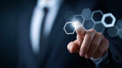 Businessman interacting with virtual hexagons in digital interface