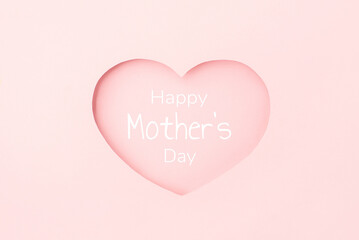 Happy Mothers Day greeting card on pink background.
