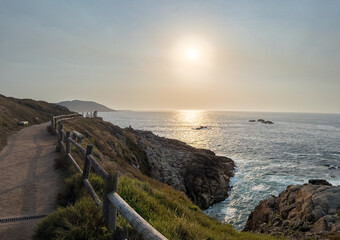 Coastal Pathway Overlooking Ocean at Sunset