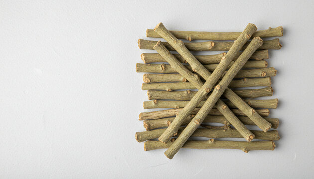 Giloy (Guduchi) Stems Flat Lay on White Background - dried Giloy or Guduchi stems (Tinospora cordifolia)