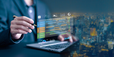 businessman using a laptop with an AI data analytics dashboard, digital project management timeline. Concept of business project planning, scheduling time, Gantt charts on control software