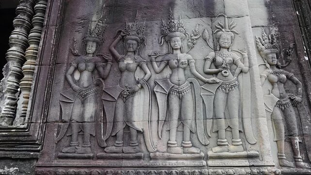 Apsara sculpture carving on the wall of Angkor Wat temple in Siem Reap Cambodia