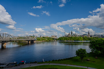 Alexandra Bridge over Ottawa River with Parliament Hill in the distance