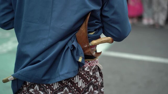 Close up of a keris worn by Yogyakarta palace soldiers during the cultural procession ritual.