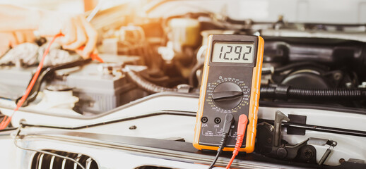 Auto mechanics use voltmeters to check battery voltage.