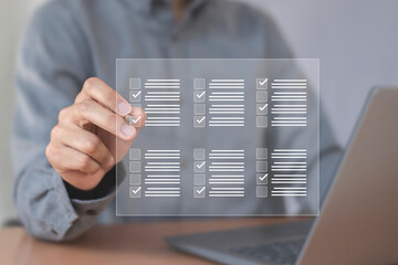 Digital document checklist on screen; productivity concepts and business technology; document integrity management.