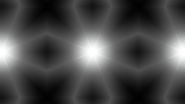 White kaleidoscope glowing light pattern on dark background animation. illumination light.
