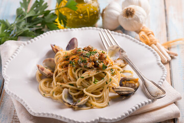 spaghetti with giant clam garlic and bottarga