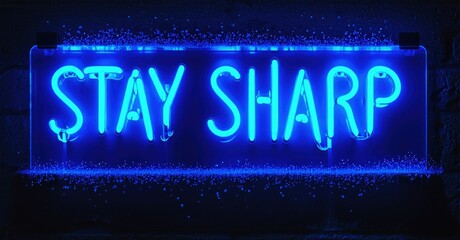 Fototapeta premium Bright blue neon sign displays Stay Sharp. Dark background emphasizes glowing text. Modern aesthetic, simple message.