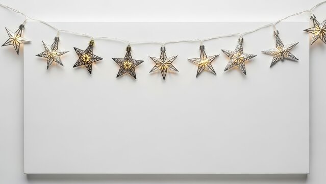 White background with a string of lights that are shaped like stars - Powered by Adobe