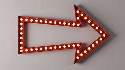 A vintage-inspired marquee arrow sign with red frame and lights on a grey background viewed from directly above