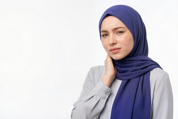 Young Malay woman suffering from severe neck pain