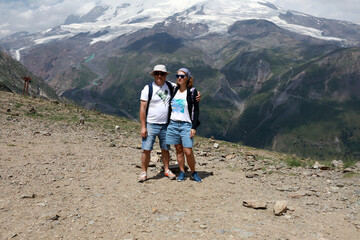 Fototapeta premium Man and woman enjoying adventure in Mount Cheget