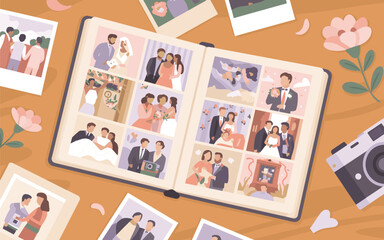 Fototapeta premium A collection of photographs and polaroids arranged in an open photo album on a wooden table with flowers and a camera nearby