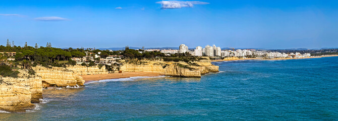 Algarve Luxury Real Estate: Panoramic 4K Aerial View of Premium Villas and Resorts in Arma&ccedil;&atilde;o de P&ecirc;ra Overlooking the Turquoise Coastline of Praia de Albandeira, Portugal