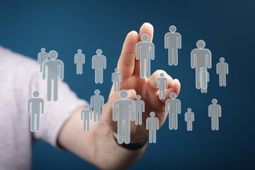 Abstract business concept with hand pointing to human figures, team and social concepts, networking...