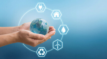 Hands holding planet earth with sustainability icons representing renewable energy water, recycling and environmental responsibility.