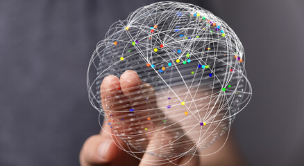 Concept image depicting a hand holding a globe overlaid with a network representing global connections and digital communication, sym