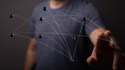 Concept of connection, technology and communication illustrated with abstract network graphic and finger. Data