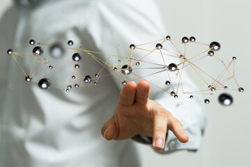 Hand reaching out to interconnected spheres. Concept of technology, connection, networking, global communicatio