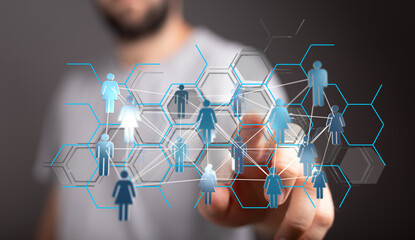 Abstract concept of online network connecting people through digital interface and a human hand touching the sc