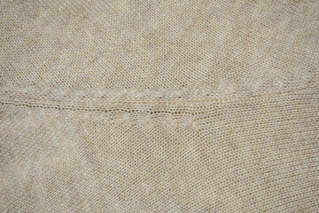 Textura o fondo de tejido de lana de jersey blanco o beige. 