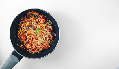 Cooked pasta spaghetti Bolognese, with tomato sauce, isolated on white background  