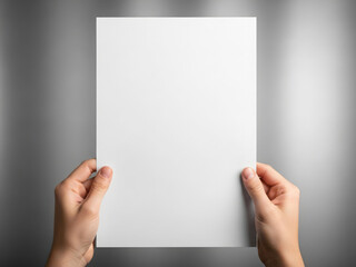 Hands holding blank paper