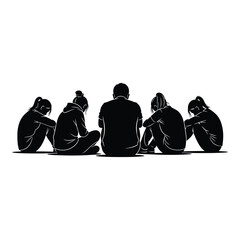 Group of people sitting in a circle heads down in silhouette