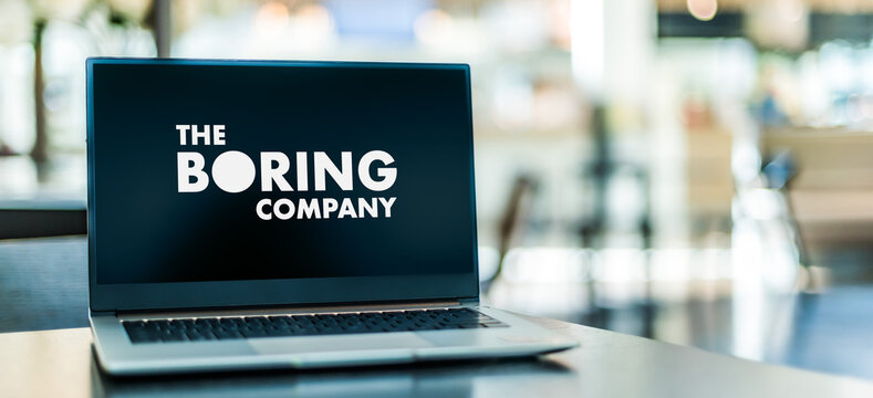 Laptop computer displaying logo of The Boring Company